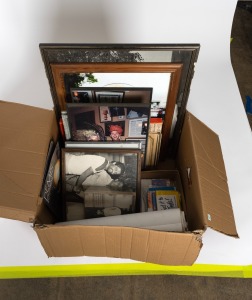 A group of mostly signed, mostly mounted and/or framed photographs, removed from a Melbourne restaurant when it was closed in 2003, the signed images include Neil Sedaka, the musician 'Sarita', and Demis Roussos, plus a box of photographs and negatives. (30+ items)