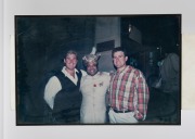 A group of mostly signed, mostly mounted and/or framed photographs, removed from a Melbourne restaurant when it was closed in 2003, the signed images include Neil Sedaka, the musician 'Sarita', and Demis Roussos, plus a box of photographs and negatives. ( - 4