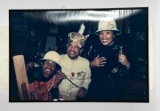 A group of eight framed mostly signed original photographs, removed from a Melbourne restaurant when it was closed in 2003, the signed images include Elton John, Billy Connolly, Sir Cliff Richard, and the Pointer Sisters, the largest 82 x 55cm overall. (8 - 4