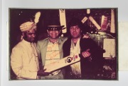A group of eight framed mostly signed original photographs, removed from a Melbourne restaurant when it was closed in 2003, the signed images include Elton John, Billy Connolly, Sir Cliff Richard, and the Pointer Sisters, the largest 82 x 55cm overall. (8 - 5