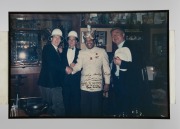 A group of eight framed mostly signed original photographs, removed from a Melbourne restaurant when it was closed in 2003, the signed images include Elton John, Billy Connolly, Sir Cliff Richard, and the Pointer Sisters, the largest 82 x 55cm overall. (8 - 8