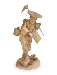 An antique Japanese carved ivory okimono statue of a farmer, Meiji Period, 19th/20th century, seal mark to base, 24cm high