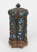 A lovely quality antique Chinese filigree silver lidded jar inlaid with cabochon, turquoise and coral, decorated with enamel birds and floral highlights, double walled construction with gilt finished interior, resting on original carved timber stand, 19th - 2
