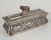 An antique Indian silver casket with repousse decoration and elephant finial, interior fitted with sandalwood, 19th century, 16cm high, 30cm wide, 1190 grams including timber lining. - 2