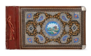 A rare Anglo-Indian Sadeli work album cover, adorned with silver and enamel decoration, 19th/20th century, 23 x 41cm overall.