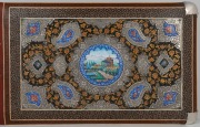 A rare Anglo-Indian Sadeli work album cover, adorned with silver and enamel decoration, 19th/20th century, 23 x 41cm overall. - 2