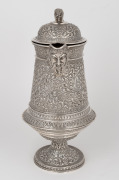 A fine quality Indian Kutch silver water jug with elephant finial and face mask spout, most likely the work of the famed silversmith OOMERSI MAWJI (1860-1930), 26cm high, 810 grams. - 2