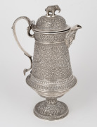 A fine quality Indian Kutch silver water jug with elephant finial and face mask spout, most likely the work of the famed silversmith OOMERSI MAWJI (1860-1930), 26cm high, 810 grams. - 3