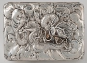 An antique Japanese export silver box decorated with dragons and clouds, Meiji Period, 19th century, 6cm high, 15.5cm wide, 11cm deep, 524 grams. - 2