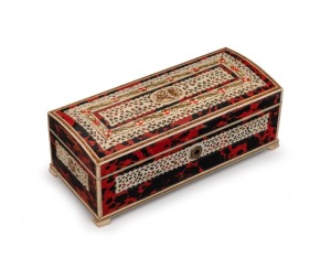 An antique Anglo-Indian carved ivory and tortoiseshell box, lined in red velvet, 19th century, ​​​​​​​8 cm high, 21cm wide, 9.5cm deep.