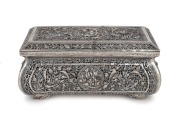 A stunning antique Indo-Chinese 900 silver bombe shaped pierced casket, sumptuously decorated with repousse birds, roses and koi carp, 19th century, stamped "900" to the base for European export, 13cm high, 28cm wide, 13.5cm deep, 856 grams total.