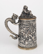 An antique Chinese silver plated export ware tankard and cover, handsomely decorated with dragon handle, seated Buddha and battle scene, engraved "RAGLAN ARCHERS, Aug. 26. 1868", ​​​​​​​17cm high. - 3