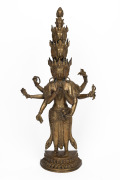A Sino-Tibetan cast brass Buddhist statue of the eleven headed AVALOKITESHVARA, 20th century, 61cm high.
