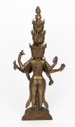 A Sino-Tibetan cast brass Buddhist statue of the eleven headed AVALOKITESHVARA, 20th century, 61cm high. - 2