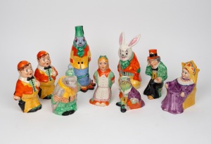 CARLTON WARE (attributed) "ALICE IN WONDERLAND" rare set of nine vintage English porcelain figures, mid 20th century, ​​​​​​​the largest 23.5cm high.