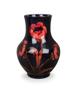 MOORCROFT "Poppy" flambe baluster shaped English pottery vase underglaze blue signature mark to base "W. Moorcroft" and impressed "MOORCROFT", 26cm high.