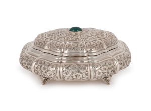 An antique Continental 800 silver lidded casket with engraved decoration and green cabochon top, 20th century, 20cm wide, 600 grams.
