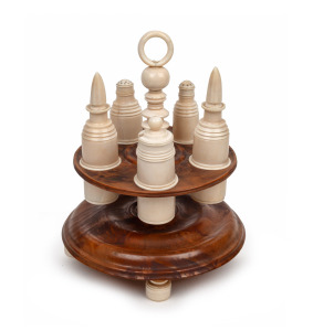 RUNNYMEDE TASMANIA, rare and important antique Australian huon pine and turned whale's tooth cruet set, mid 19th century, 27cm high. PROVENANCE: Bayly family by descent.