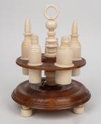 RUNNYMEDE TASMANIA, rare and important antique Australian huon pine and turned whale's tooth cruet set, mid 19th century, 27cm high. PROVENANCE: Bayly family by descent. - 2