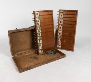BOOKMAKER'S BOARD: Two original bookmaker's betting boards, showing odds for twelve horses on each board, in original timber carry case, overall 77 x 81.5cm when opened.