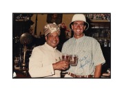 AUSTRALIAN & OTHER TEST CRICKETERS: A group of signed original photographs collected by cricket tragic Larry Mendonca, from when famous cricketers visited his restaurant in Melbourne. Signatories include David Boon, Hansie Cronje, Viv Richards, and Javed - 3