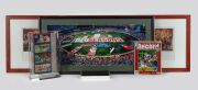 1996 AFL CENTENARY GRAND FINAL: A group comprising four souvenir finals tickets (section N18, Row D, Seat 1), an aerial view of the pre-game entertainment showing the capacity crowd at the MCG (framed and glazed, 44 x 89cm overall), a panoramic photograph