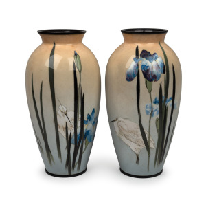 A pair of antique Japanese cloisonne vases with cranes and irises, beautifully executed using the Musen shippo technique, Meiji period, 19th/20th century, 37cm high.