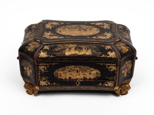 An antique Chinese export ware lacquered sewing box with ornate gilt decorated finish and carved bat feet, interior fitted with lift-out tray and compartments with numerous original carved ivory implements, 19th century, 16cm high, 33cm wide, 25cm deep.