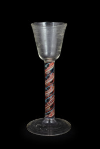 An antique cordial glass with blue, red and white cotton twist stem, 18th century, 14.5cm high