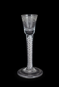 An antique cordial glass with white double twist stem, engraved decoration and folded foot, 18th century, 17cm high.