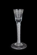 An antique cordial glass with white double twist stem, engraved decoration and folded foot, 18th century, 17cm high.
