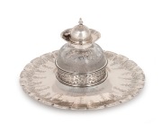 An antique English sterling silver and crystal inkwell engraved "A Testimony Of Regard From The Honourable York Scarlett", by Stewart Clifford of London, circa 1873, 13cm high, 22cm wide, the silver base (not including crystal) 497 grams.