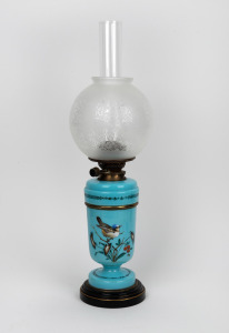 An antique English blue glass kerosene lamp with hand-painted decoration, duplex black button single burner with bayonet mount, chimney and later shade, 19th century, ​​​​​​​66cm high overall.