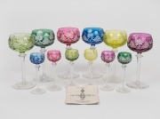VAL ST LAMBERT "Harlequin Hocks" set of six coloured cut crystal wine glasses; together with a matching set of six schnapps glasses, (12 items), with original documentation from Hardy Brothers of Melbourne, 18cm and 13cm high.