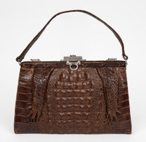 A vintage crocodile skin lady's handbag, mid 20th century, 30cm wide.