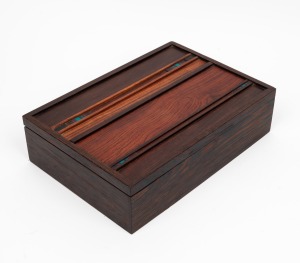 An American rosewood Modernist design jewellery box with lift out tray made by ROBERT McKEOWN, circa 1985, ​​​​​​​signed by the maker on the base. 8.5cm high, 32cm high, 22cm high.