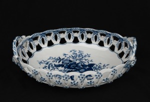 BOOTHS antique English blue and white porcelain pierced basket with floral motif, 19th century, hand-painted monogram to base, 9cm high, 25.5cm wide.