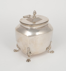 An antique sterling silver tea caddy with paw feet, made in Birmingham, circa 1900, 11cm high, 188 grams.