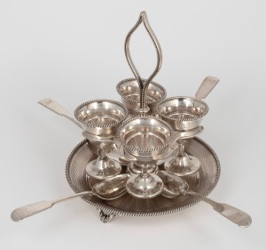An antique English sterling silver egg cruet with associated spoons, made in Birmingham, 19th century, 20cm high, 680 grams total.