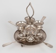 An antique English sterling silver egg cruet with associated spoons, made in Birmingham, 19th century, 20cm high, 680 grams total.