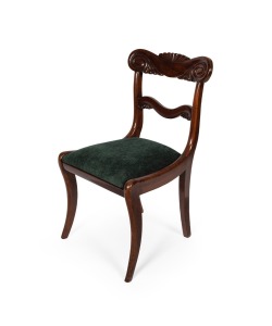 A fine quality antique English mahogany dining chair with ornately carved back and sabre legs, early 19th century