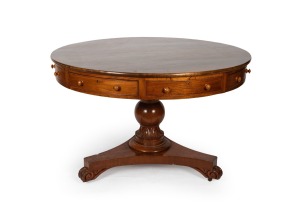 An antique drum table with turned and carved column and platform base, crafted in Indian teak, cedar and red gum secondaries, 76cm high, 118cm diameter