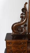 An antique huon pine dressing table with carved decoration, circa 1875. Note: Later walnut stain. A good restoration project. 175cm high, 123cm wide, 63cm deep - 2