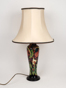 MOORCROFT "Queen's Choice" English pottery table lamp and shade on dark blue ground, in original box of issue, embossed factory mark to felt base, 75cm high overall.