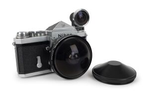 NIPPON KOGAKU: Nikon F SLR camera [#7036896] with Fish-eye-Nikkor 7.5mm f5.6 lens [#750727], Nikkor fish-eye viewfinder [#388813], and lens caps, c. 1969.