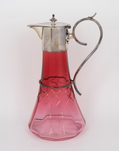 An antique English ruby glass claret jug with silver plated mounts, late 19th century, 26.5cm high.