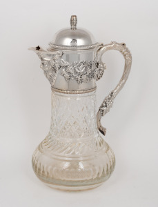 An antique English crystal claret jug with Bacchanalian silver plated mounts and barrel finial, 19th/20th century, 31cm high.