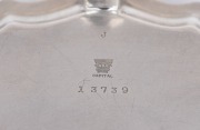 An antique sterling silver salver in the Georgian style, manufactured in London, circa 1924, 23cm wide, 382 grams. - 2