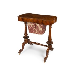An antique English burr walnut sewing table with lift top, interior fitted with compartments and wall bag, circa 1870, ​​​​​​​72cm high, 67cm wide, 40cm deep.