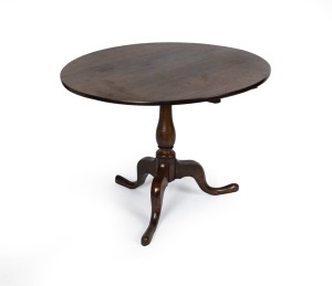 An antique English oak tilt-top circular Georgian breakfast table, late 18th century, 70cm high, 91cm diameter